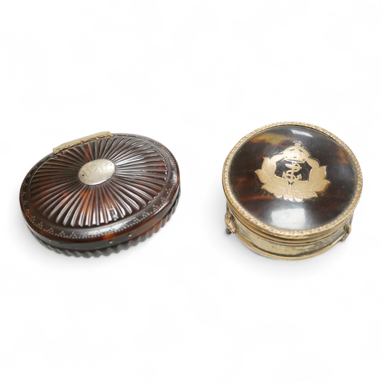 An 18th century tortoiseshell oval fluted snuff box, 89mm and a George V silver and tortoiseshell mounted trinket box, London, 1916.